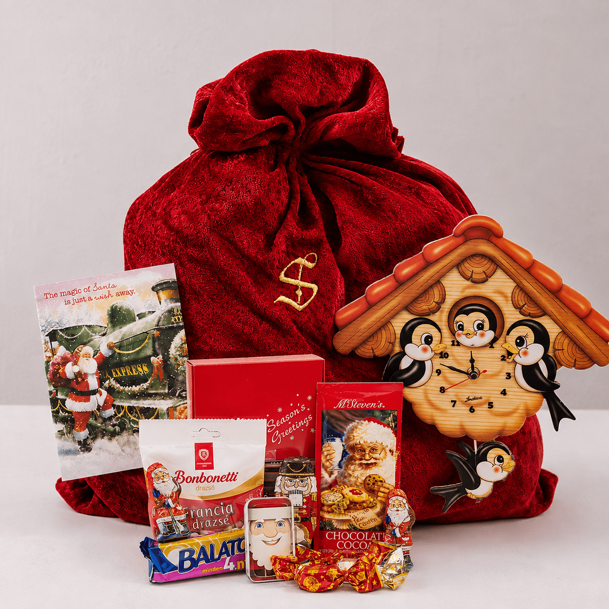 Swallows Wall Clock And Santa’s Chocolate Gifts Swallows Wall Clock And Santa's Chocolate Gifts - Image 1