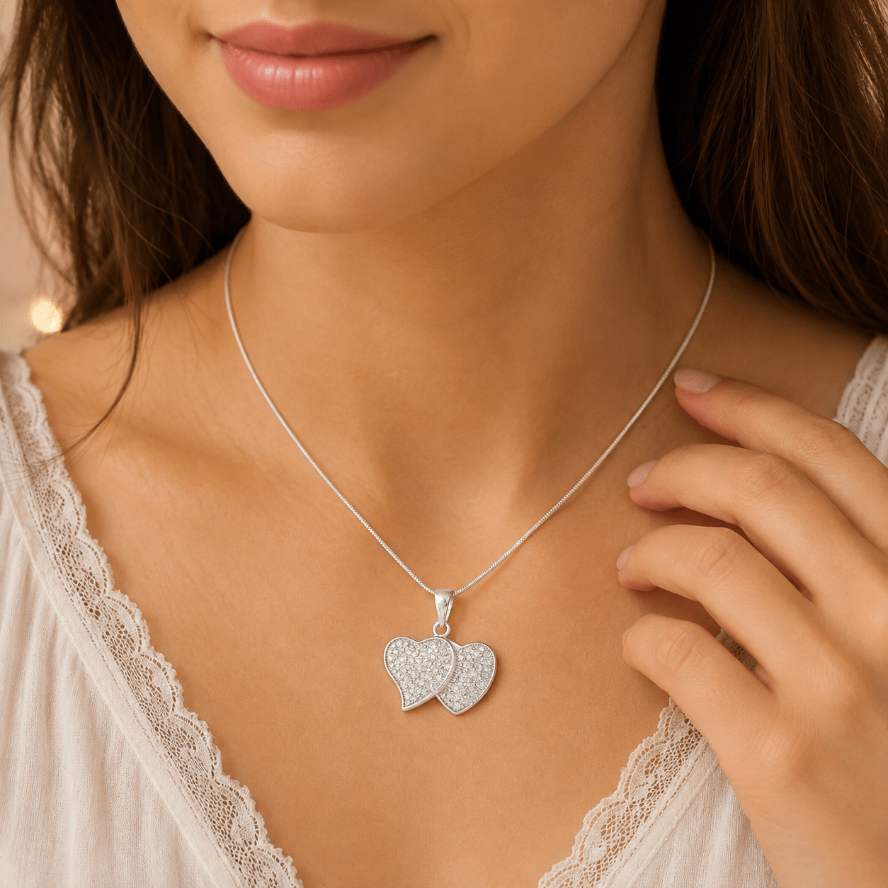 double heart1 Double Heart Silver CZ Pendant – 20” Silver Snake Chain - Image 1