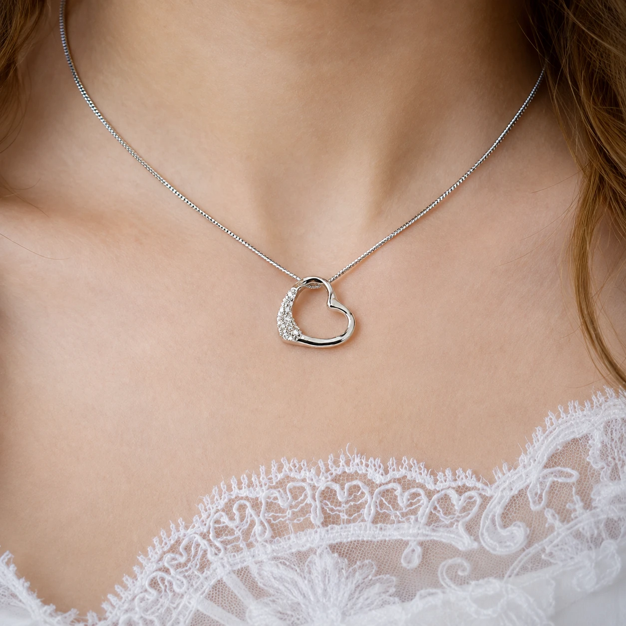 Sterling Silver Floating Heart Pendant with Embedded Stones Sterling Silver Floating Heart Pendant with Embedded Stones - Image 1